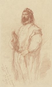 Homem de pé com estátua de Gustave François Morin