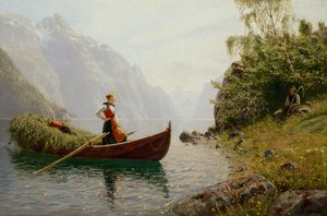 Mulher e homem na paisagem do fiorde