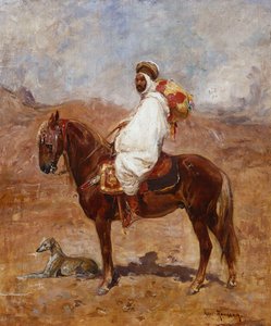 Um árabe em um cavalo em uma paisagem de deserto
