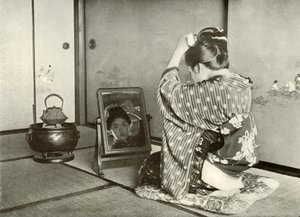 Preparando-se para o dia, 1910. de Herbert Ponting