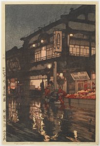Rua Kagurazaka após uma chuva noturna