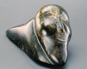 Homem sorridente, de Cape Dorset (pedra sabão) de Inuit School
