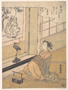 Uma jovem sentada num quarto a observar um kakemono de Fukurokujin de Isoda Koryusai