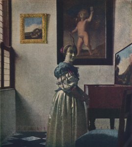 Uma senhora de pé nas virgens, c1670-1672, c1950. de Jan Vermeer van Delft