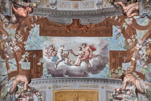 Vénus dá a coroa a Ariadne; nas nuvens, Vénus, rodeada de cupidos, oferece a coroa de Vulcano a Ariadne, sentada ao lado de Baco
