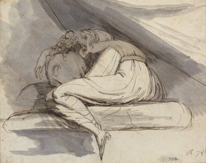 Mulher sentada, enrolada