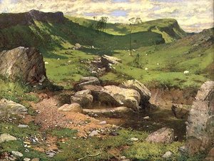 Um riacho rochoso em uma paisagem montanhosa