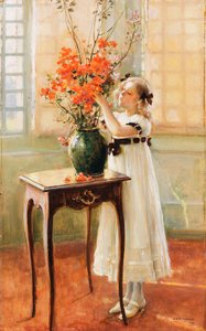 Uma jovem arrumando flores de primavera