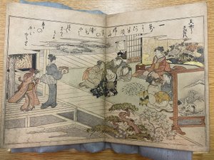 Uma página de Gifts from the Ebb Tide de Kitagawa Utamaro