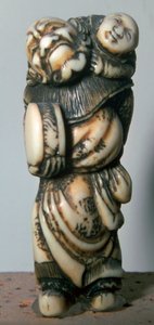 Netsuke japonês de uma bailarina e criança chinesa, do século XVIII.   de Masahira