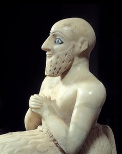 Art Mesopotâmia: Estátua do Intendente Ebih-il. Escultura de albastro, concha, lápis-lazúli e xisto, por volta de 2500 AC (período Sumério, por volta de 2900-2200 AC). De Mari. Altura: 0,525 m. Paris, Museu do Louvre.