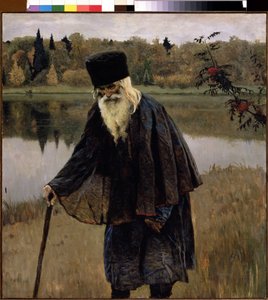 Um eremita (Um eremita). Um homem velho com barba e cabelos brancos caminha, dobrado na sua bengala, na margem de um lago. Pintura de Mikhail Vasilyevich Nesterov (1862-1942), óleo sobre tela