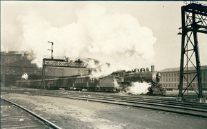 Comboio ferroviário que sai da Estação Union, St. Louis de Oscar C. Kuehn