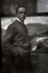 Retrato de três quartos de Cesare Maggi. O pintor, vestido de avental, está segurando uma paleta na mão esquerda. No fundo, a tela em que ele está trabalhando