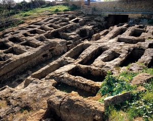 Ruínas da necrópole cristã no vale dos Templos, séculos IV a V. Agrigento, Agrigento. Sicília, Itália de Paleo Christian