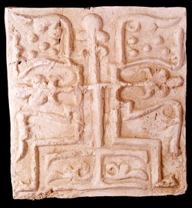 Arte Paleocristã: pedra adornada com relevos de ramos de vinha e uma cruz. Da ilha de Kharg, Irão. Paris, Museu do Louvre de Paleo Christian Paleo Christian