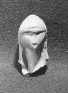 Cabeça de uma mulher conhecida como Vênus de Brassempouy, c. 21000 aC
