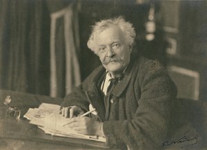 Félix Nadar sentado à secretária de Paul Nadar