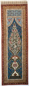 Um kalimkari de algodão vitrificado pintado e impresso com papagaios e outros pássaros empoleirados nos galhos de uma árvore em forma de chamas de Persian School