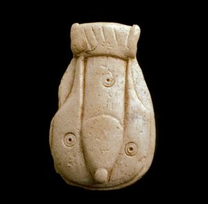 Civilização Fenícia: amuleto fálico no osso. Do site de Puig d