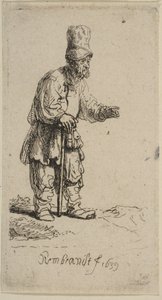 Um camponês de boné alto, de pé, apoiado em uma vara, 1639. de Rembrandt van Rijn
