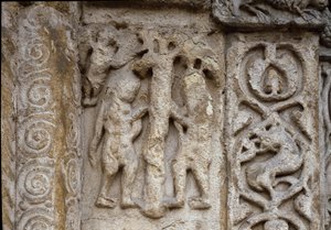 Adão e Eva. Detalhe da fachada do Basilicano, século XII de Ealy (relevo) de Romanesque