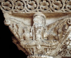 Capital representando São Pedro na sua cruz (escultura de Romanesque