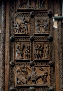 Arte românica: porta de madeira de meados do século XII da Igreja de Santa Maria do Capitólio em Colónia, Alemanha (Sankt Maria im Kapitol, Koln). Cenas que mostram o anúncio aos pastores, a natividade, a adoração dos magos e o de Romanesque