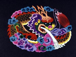 Papel chinês cortado e colorido com um dragão de School Chinese