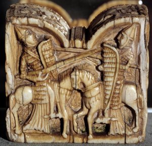 Arte românica: peão de damasco representando uma batalha entre dois cavaleiros. Escultura de marfim. De Espanha. Dim. 0,64x0,68 m. Paris, Museu do Louvre. de School Spanish