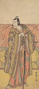 Ichikawa Danjuro V como Kudo Suketsune, ricamente vestido, apoiando-se em sua espada, final do século XVIII. de Shunsho