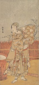 O ator Sawamura Sojuro III segurando um pedaço de brocado, final do século XVIII. de Shunsho