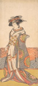 O terceiro Segawa Kikunojo como uma mulher em pé em uma sala com um padrão de onda Dado, ca. 1779. de Shunsho
