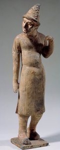 Arte chinesa: Estatueta sogdiana, terracota bárbara com chapéu pontiagudo carregando seda (do atual Uzbequistão). Século VI ou VIII. Paris, Museu Cernuschi de Sogdian Sogdian