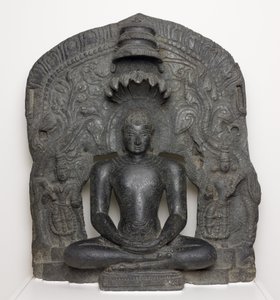 Jaina Tirthankara Parshvanatha com capuz de serpente sentado em meditação (Dhyanamudra), de Karnataka, Índia (clorito) de South Indian School