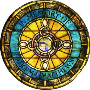 Uma janela circular de vidro com chumbo da Tiffany Studios (vidro com chumbo)