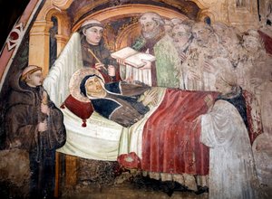 A morte de São Escolástico (v. 480- v. 543), irmã de São Bento de Nursie Ela está rodeada de monges beneditinos. Fresco da escola da Úmbria do século XV. Mosteiro de São Benedetto (Sacro Speco), Subiaco (Roma), Itália.