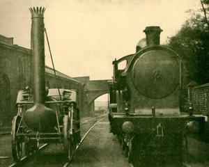Um modelo em tamanho real do foguete Stephensons ao lado de um motor da George a quinta classe, Londo de Unbekannt