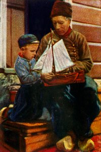 Pai e filho holandeses em trajes tradicionais, c1928. de Unbekannt