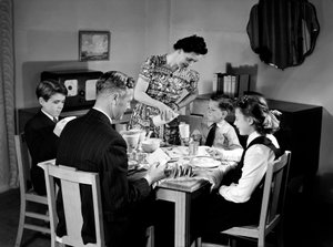 Família ao pequeno-almoço, c 1948 de Unbekannt
