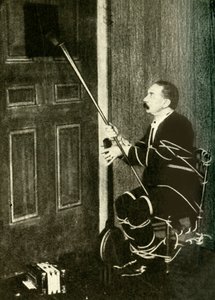 John Nevil Maskelyne realiza uma ilusão de gabinete espiritual, c1910. de Unbekannt