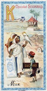 Letra K: kabyle, kepi, quilograma, kakatoes, quiosque, quilômetro. Gravura do Alfabeto editada por Chocolat Suchard, início do século XX. 24 cromolitógrafos representando lugares, personagens e objetos a serem descobertos na imagem. Dim: 105x55mm de Unbekannt