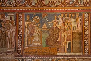 Imperador Constantino apresentando sua tiara imperial ao Papa Silvestre, dando-lhe domínio sobre Roma, parede oeste da Capela de San Silvestro, 1246 de Unknown
