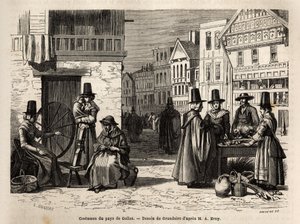 Uma rua no País de Gales, com moradores locais vestidos com trajes tradicionais e atividades cotidianas: uma família de primeira mão e mulheres girando lã com rodas. Engravure pour illustrrer un voyage dans le pays de Wales, en 1862, par Alfred Erny, in "L de Unknown artist