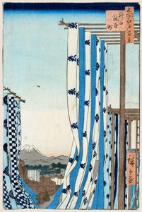 O distrito dos tintureiros em Kanda cem vistas famosas de Edo, 1856-1858. de Utagawa Hiroshige