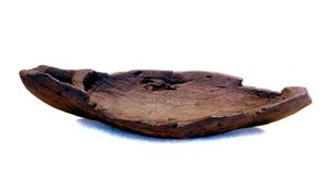 Brinquedo de madeira Viking na forma de um navio (drakkar) encontrado perto de um local Viking na Gronelândia.