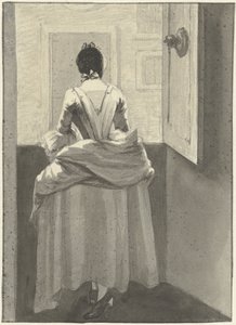 Mulher de pé em frente a uma porta