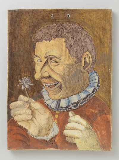 prato de faiança com homem com flor de Anonymous
