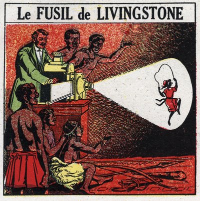 A projecção: A espingarda de Livingstone. David Livingstone (1813-1873) missionário e explorador escocês com a lanterna mágica da tribo Balonda na África. Ilustração anônima de 1925. Coleção particular. de Anonymous Anonymous