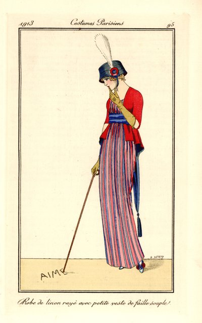 Mulher com vestido de linho às riscas e colete em seda macia com nervuras ou falha, chapéu com cockade. Ela escreve o amor com a sua bengala na areia. Robe de linon raye avec petite veste de faille souple. Gravura de pochoir (stencil) colorida à mão, depoi de B Berty